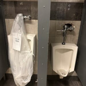out of order urinal in a bar